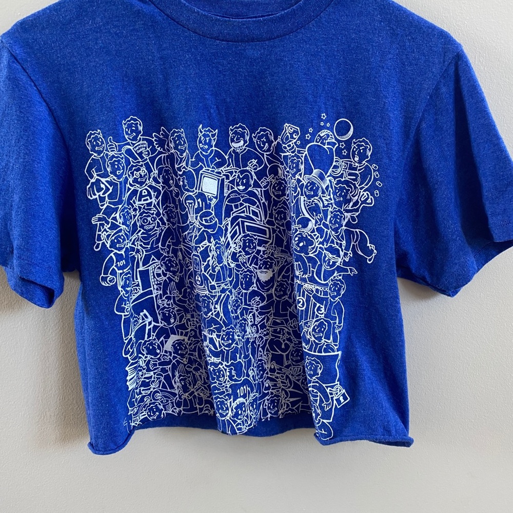 cropped blue shirt with cartoon characters on it